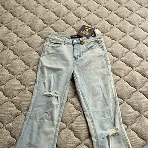 Light blue pair of jeans brand new indigo rein size 7 W27 length 32 1/2